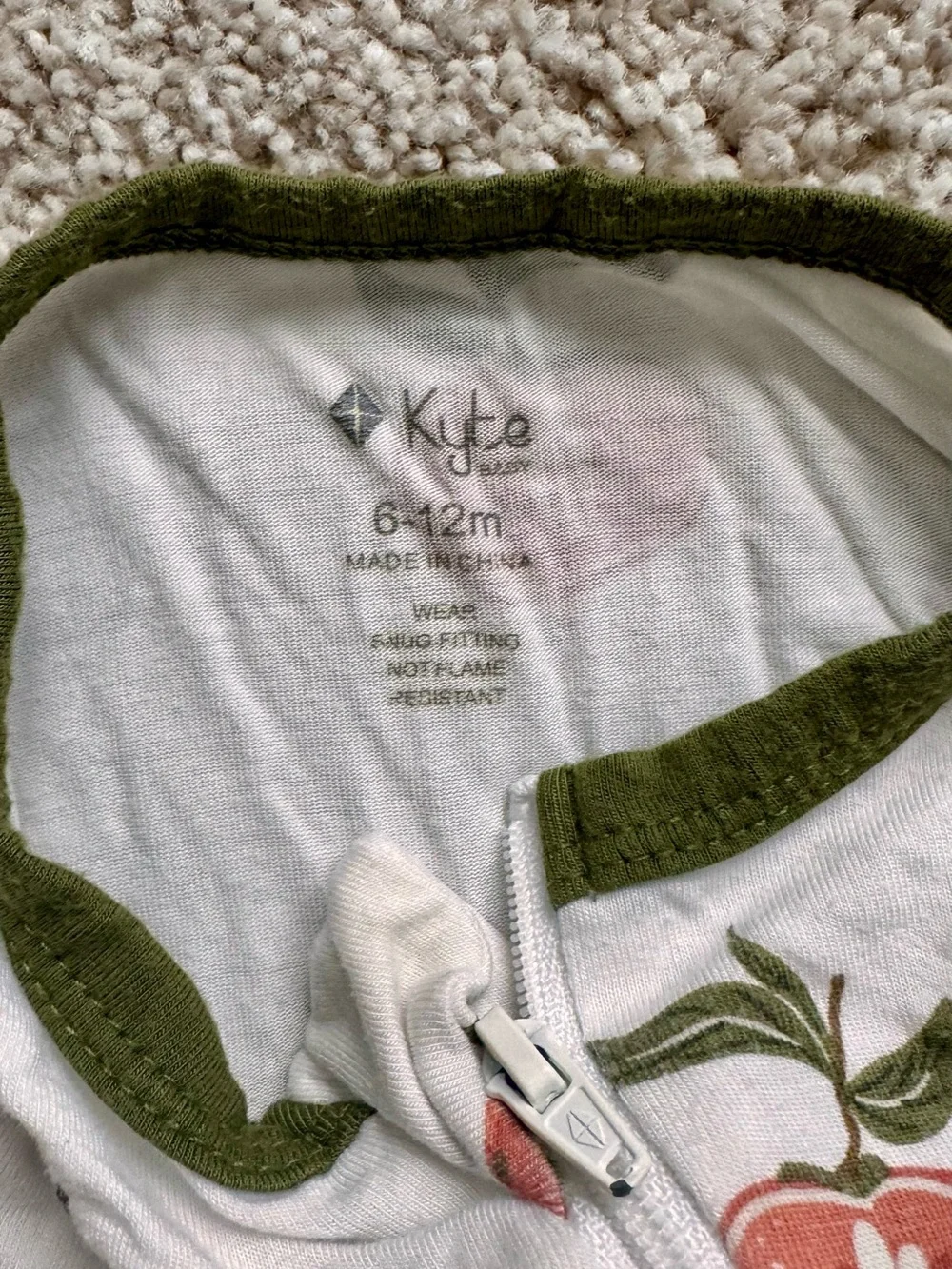 Kyte BABY White Footed Zipper Romper with Red Apple Print and Olive Trim